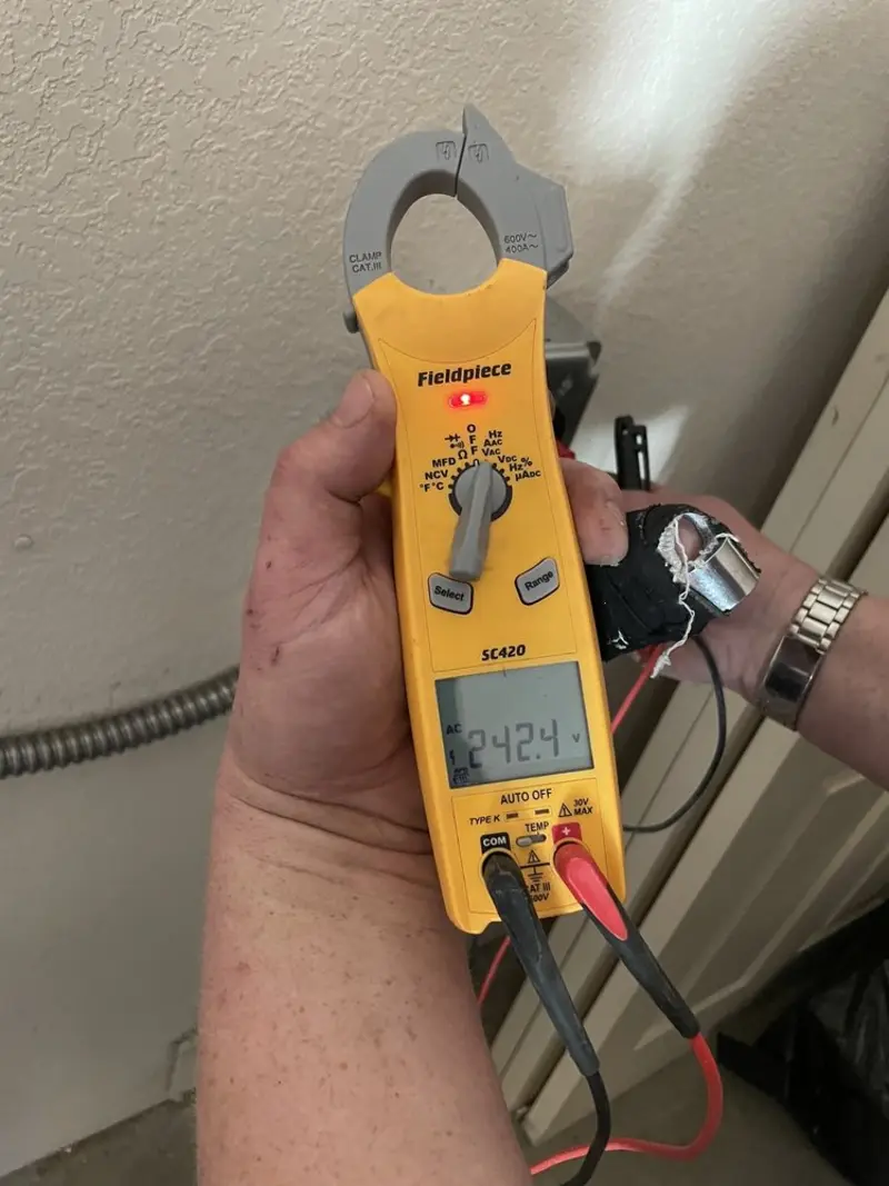 Voltage testing with clamp meter during Generator Installation in Larksville